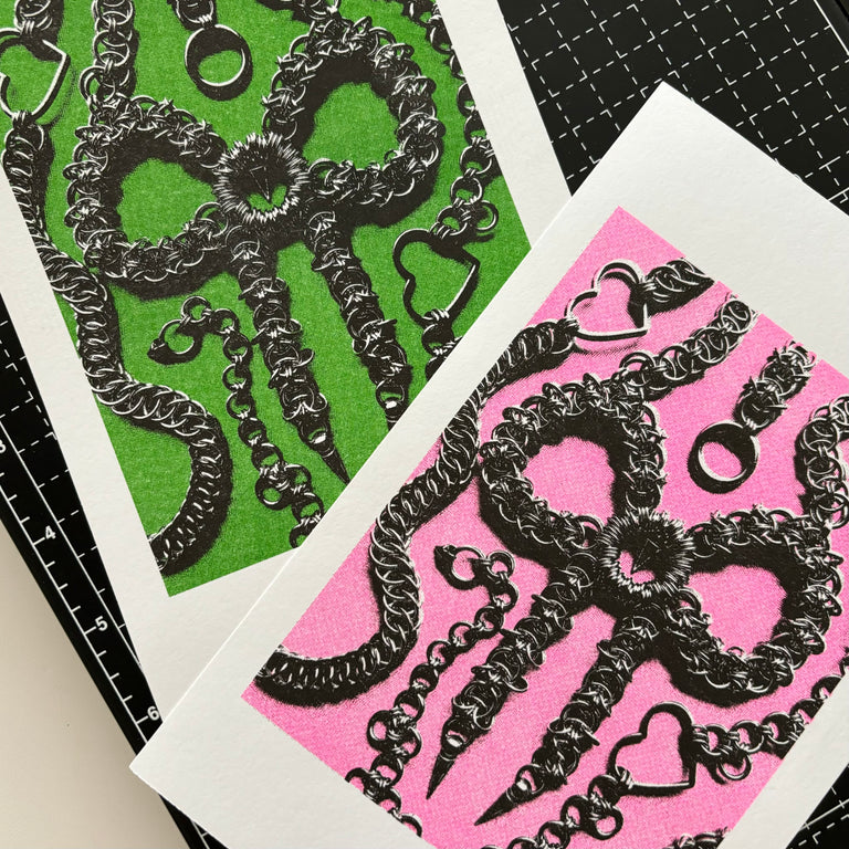Black chainmaille designs on pink and green risoprint backgrounds