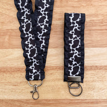Load image into Gallery viewer, Cow Print Ruffle Lanyard / Key Chain
